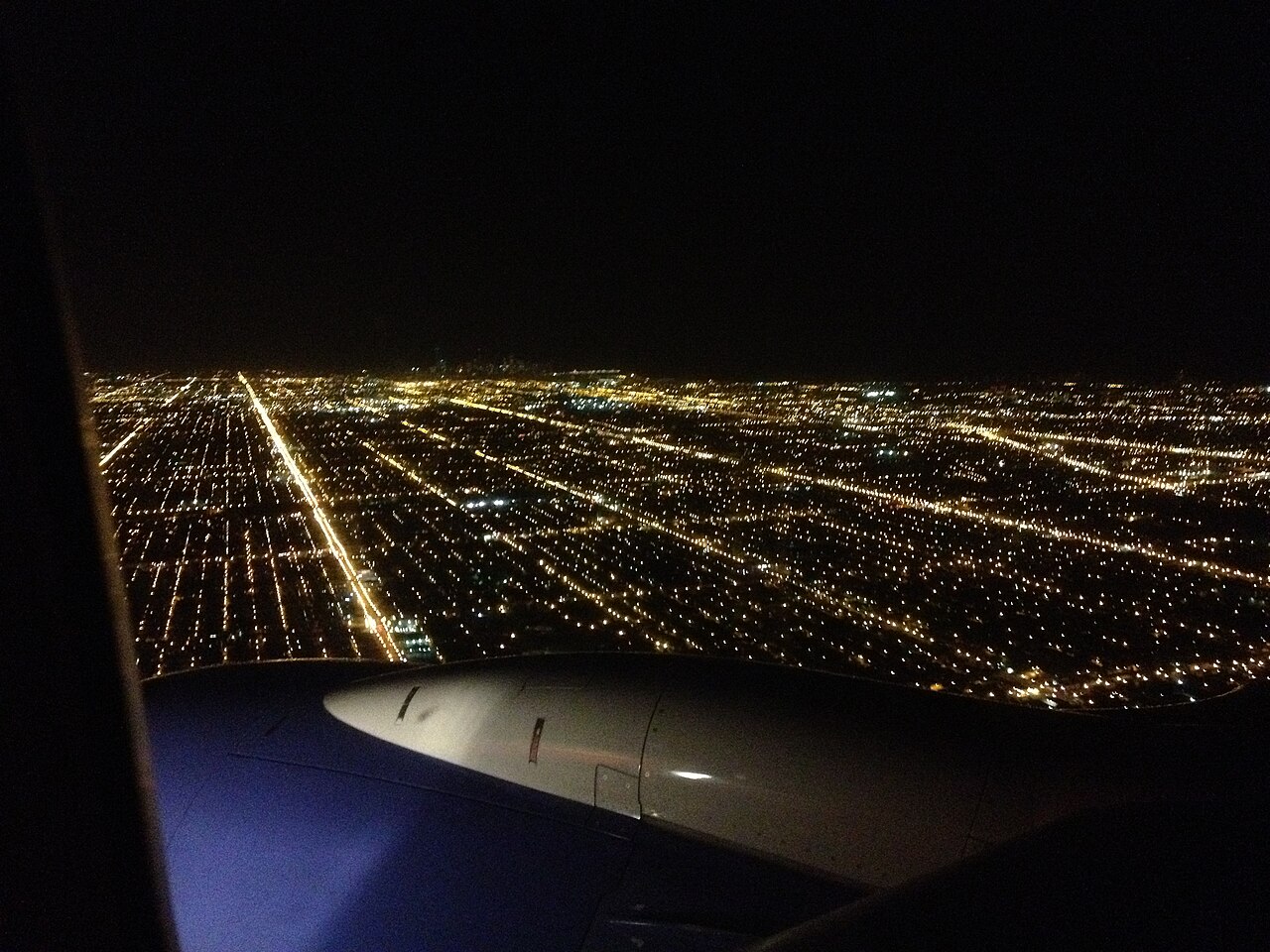 View of Los Angeles from the window of a commercial jet approaching Los Angeles International Airport by night. File photo.