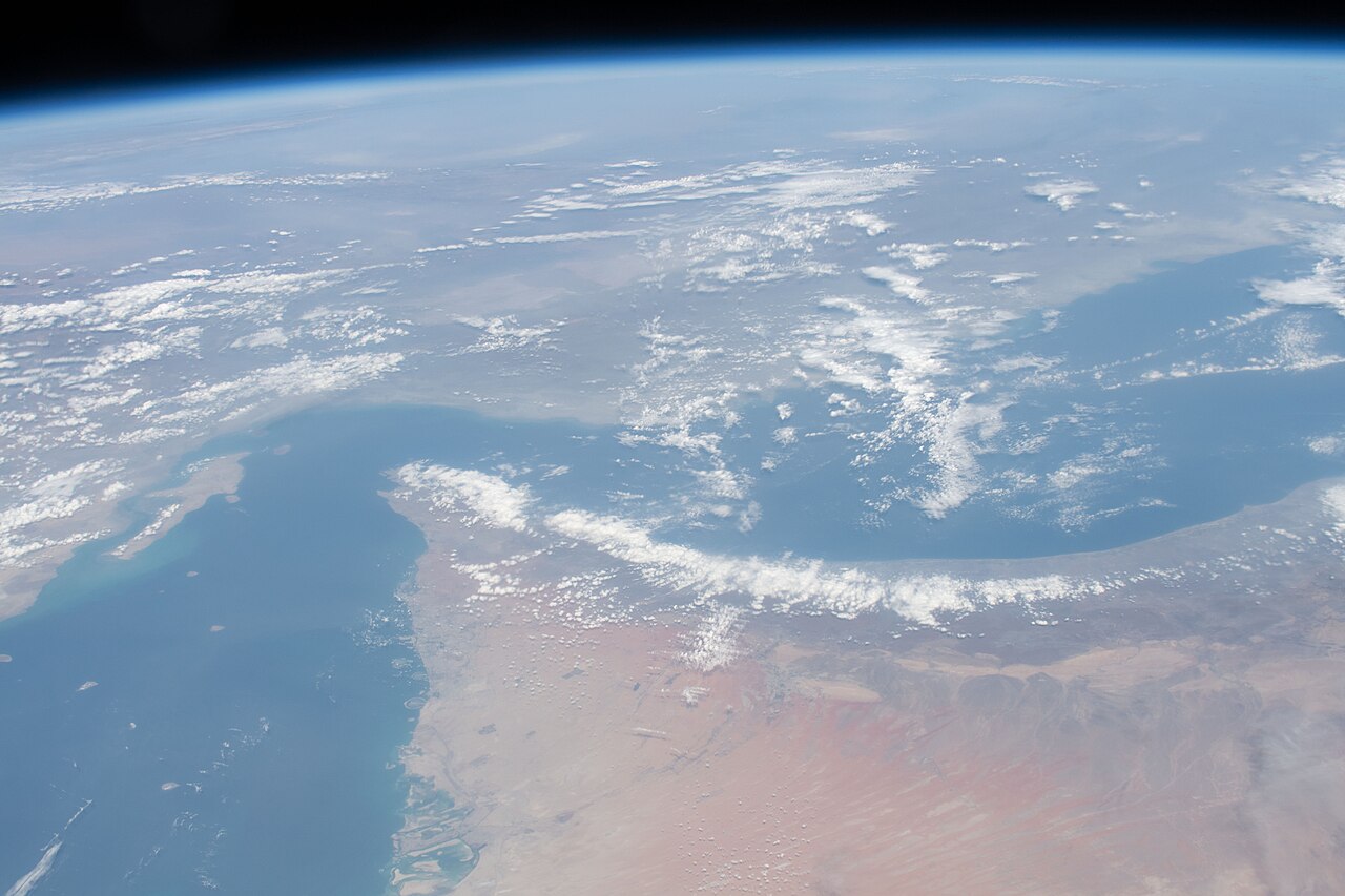 The Strait of Hormuz, islands and clouds.