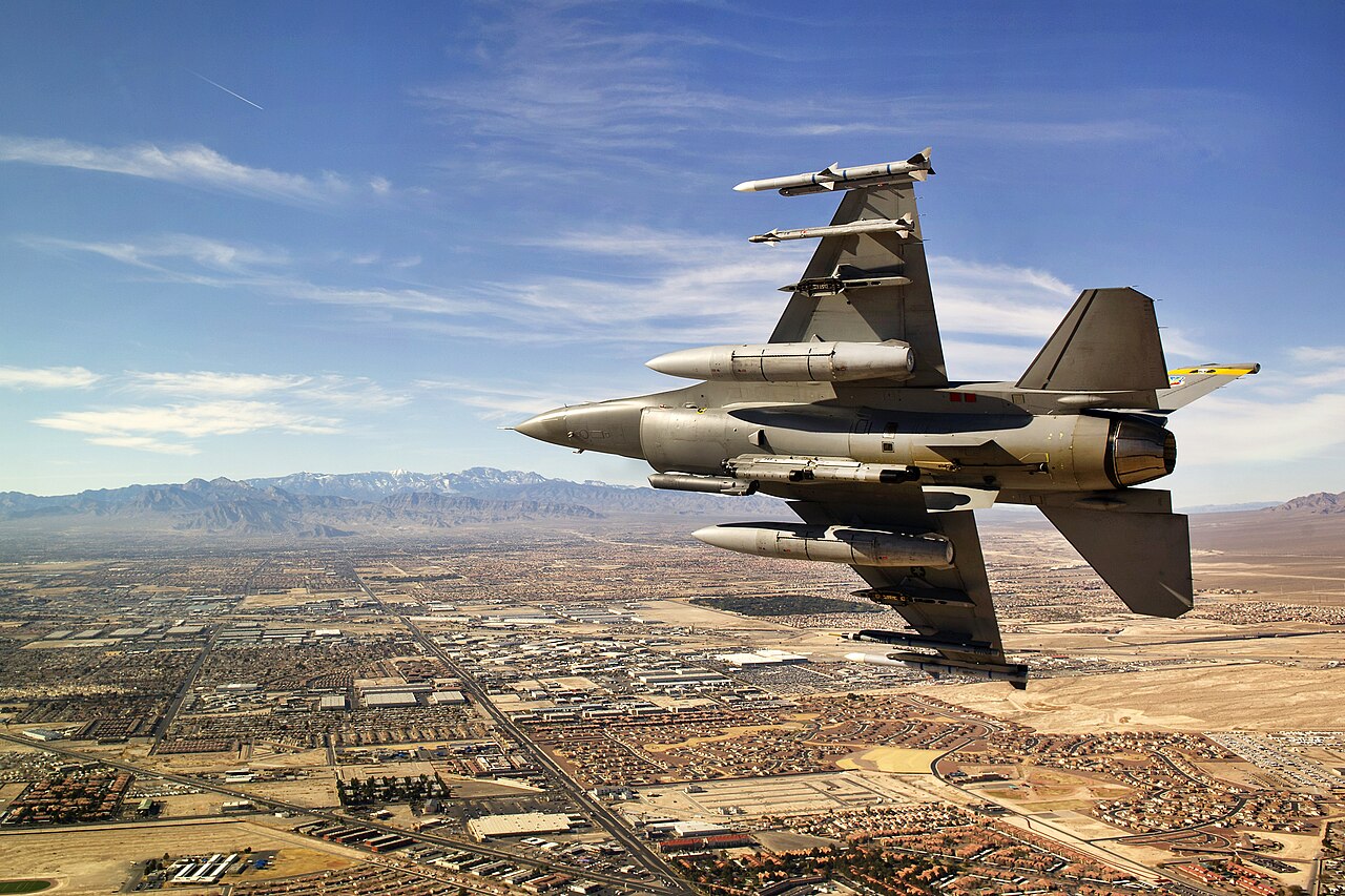 A U.S. Air Force F-16 Fighting Falcon breaks right on final approach during a training exercise.
