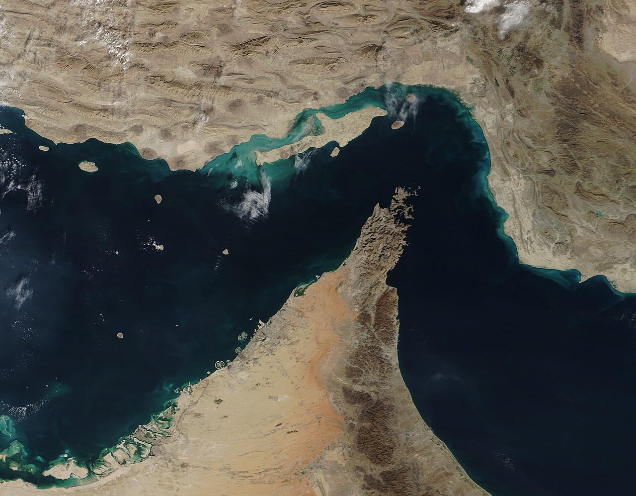 The Strait of Hormuz between Iran and the Arabian Peninsula.