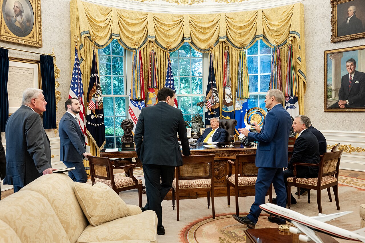 President Donald Trump speaks with Middle East Envoy Steve Witkoff and others in the Oval Office.