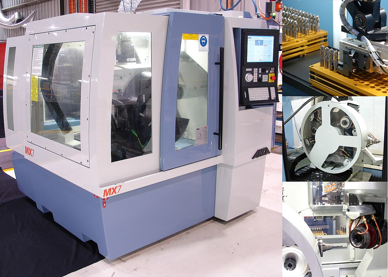 A modern CNC tool and cutter grinder with automatic tool loading.