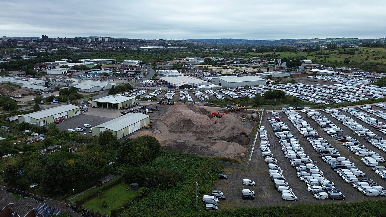 Aerial view of an industrial complex showing the wider layout of interconnected facilities.