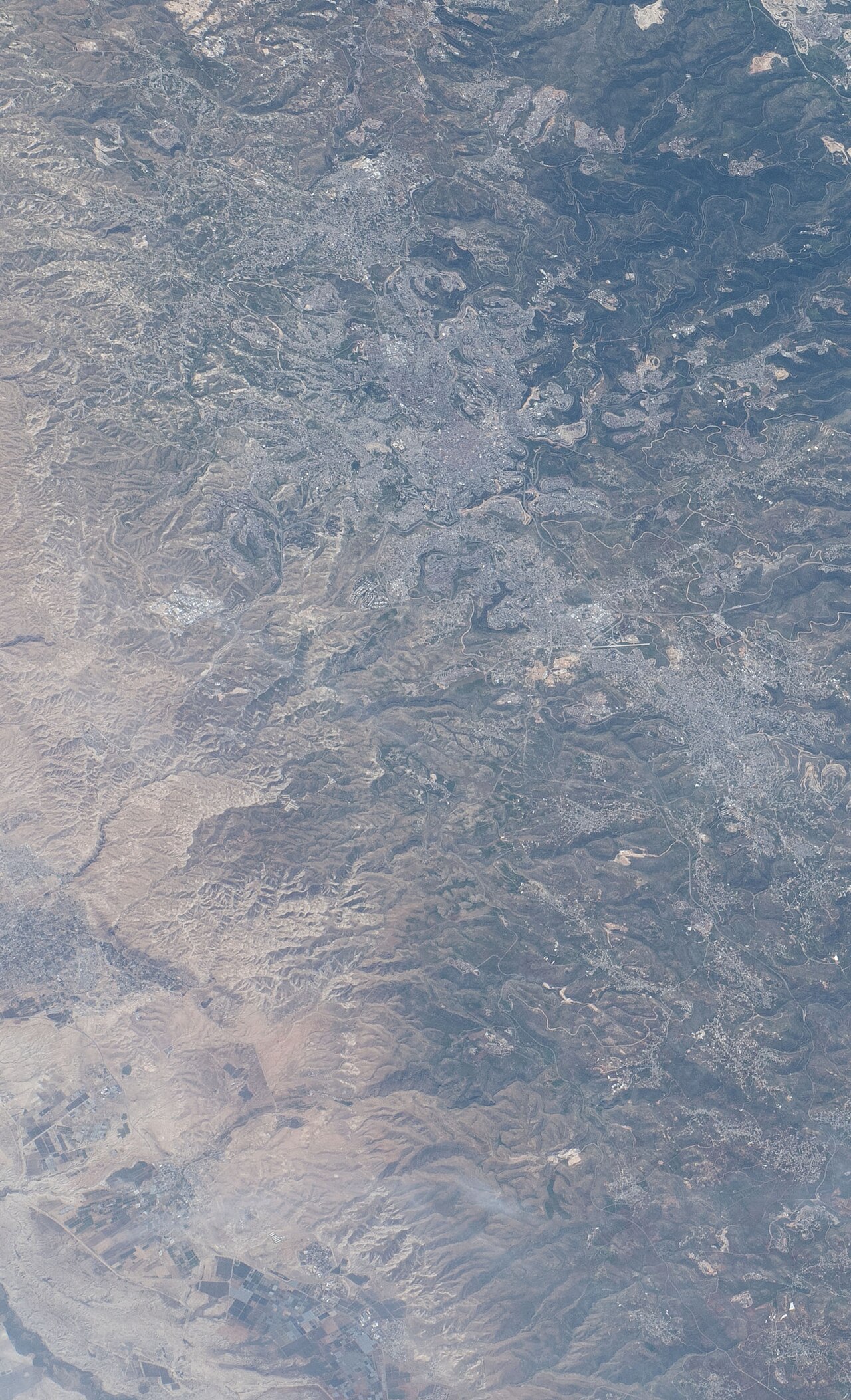 View of Israel and Palestine showing Jerusalem, Mount Scopus, towns and villages of the West Bank, and Ramallah.