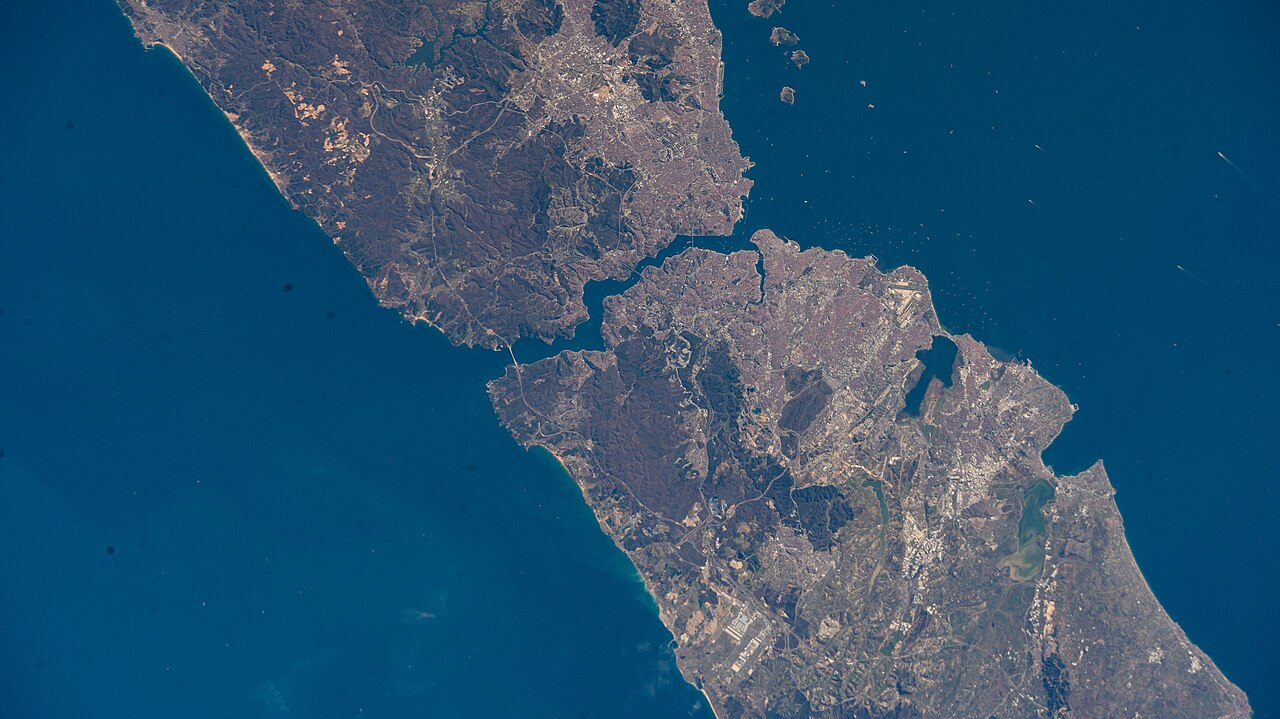 Contains modified NASA International Space Station imagery showing the Bosphorus Strait splitting Istanbul and connecting the Black Sea with the Sea of Marmara.