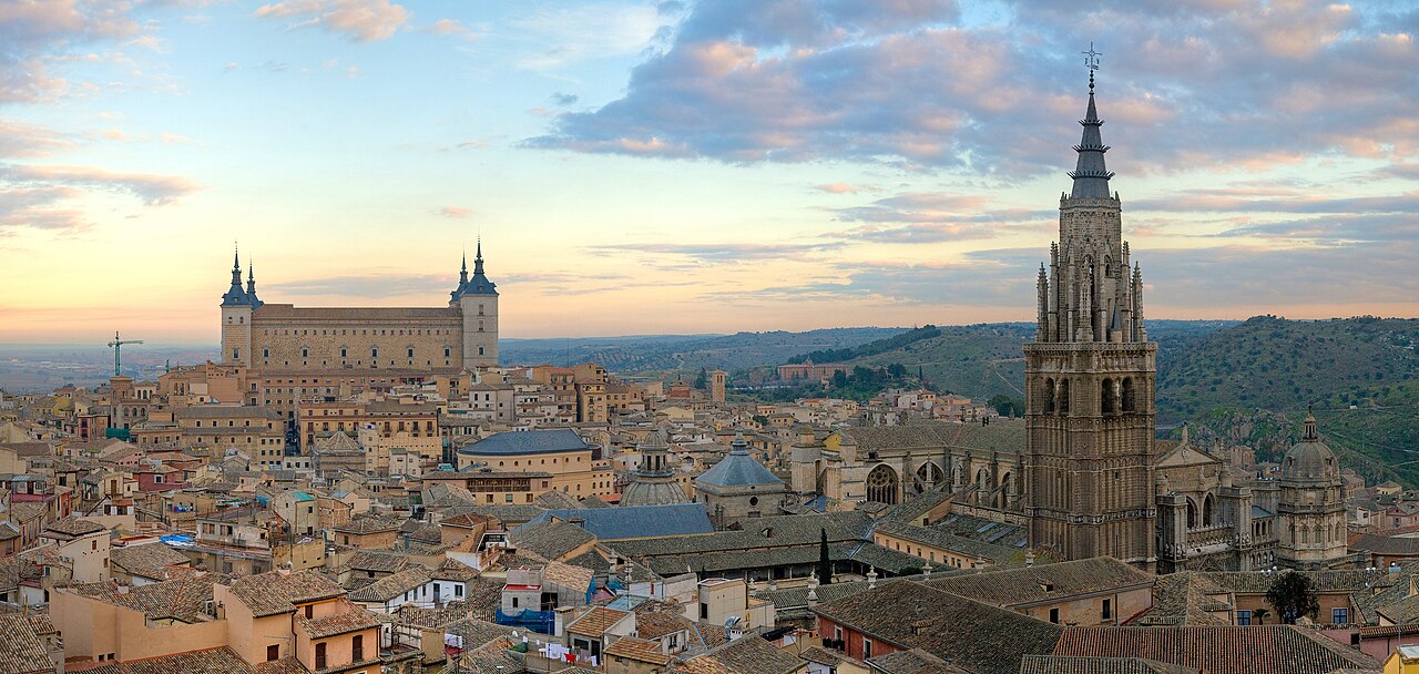 A panorama of the Toledo skyline in Spain at sunrise, with the Alcázar and Cathedral visible. File photo.