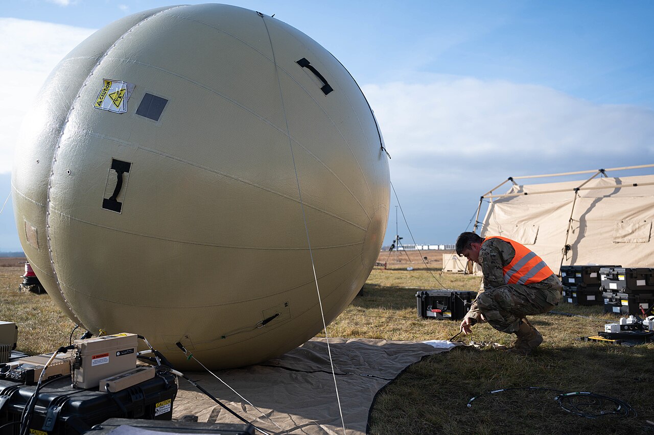 A U.S. Air Force airman next to a ground antenna at Rzeszów-Jasionka Airport in February 2022.