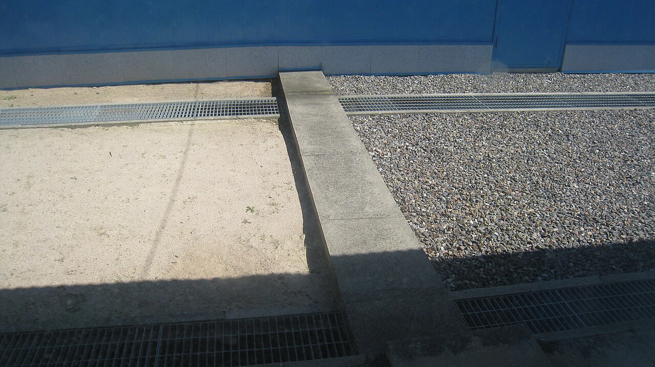 A concrete slab marks the border between North and South Korea in the Korean Demilitarized Zone.