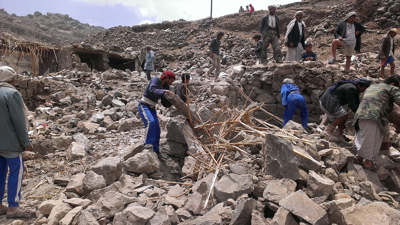 Villagers in Hajar Aukaish, Yemen, during 2015 bombing.