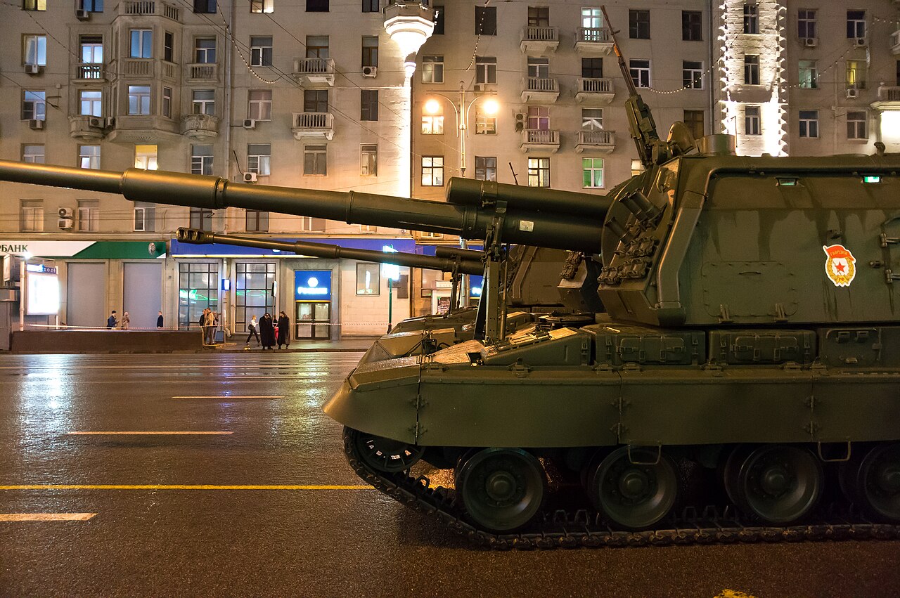 Msta-S self-propelled artillery guns on Moscow streets during military parade rehearsal.